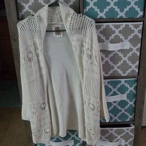 Cream cardigan.